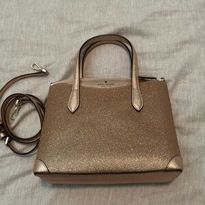Kate spade tinsel glittery rose gold crossbody. Strap included.